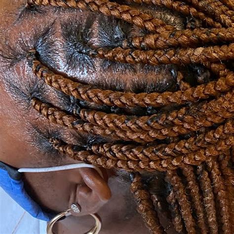 The following are some African braided ponytail style that any la