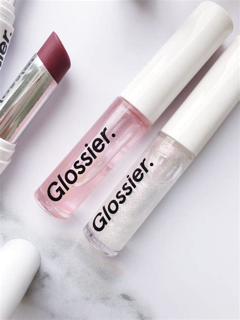 Glossiest lip gloss by glossier. The glossiest lip gloss. Glides on with a doe-foot applicator for cushiony glassy finish, no grit, no goop. Skip To Main Hi friend! Enjoy 20% off your order for a limited time. Terms Apply. Free Shipping on orders $40+ Free standard shipping on orders $65 CAD+. 