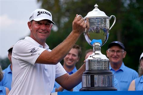 Glover wins Wyndham Championship. Thomas season ends by inches.