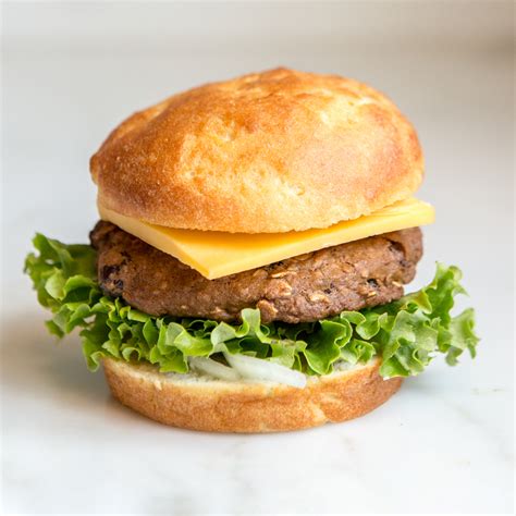 Gluten free hamburger. Shape into a softball size bun and gently place on baking sheet. Repeat until batter is all gone. Gently grease the tops and place plastic wrap on top while the buns rise for an additional 15-20 minutes. … 