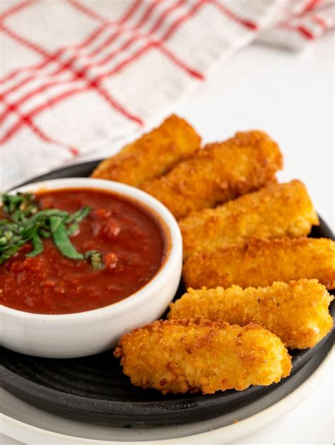 Gluten free mozzarella sticks. Dip each cheese stick in the gluten-free flour, followed by the egg and finally the gluten-free panko. Place each coated stick on the … 