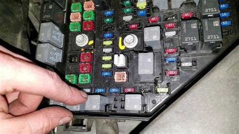 Gmc acadia fuse box removal. Then, remove fuse/relay box cover and flip open protective cover on remote positive terminal. Loosen nut and remove battery-positive cables from stud. Unbolt two bolts holding up part of the fuse/relay box to junction blocks and disengage tabs through screwdriver along with perimeter of upper portion. 