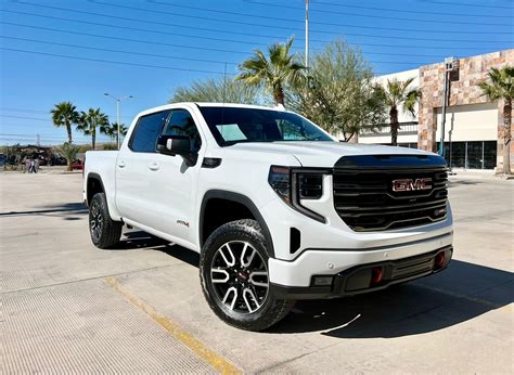 10-Speed Automatic, 4WD, Jet Black With Kalahari Accents Leather. 2023 GMC Sierra 1500 AT4 EcoTec3 6.2L V8 4D Crew Cab 10-Speed Automatic Summit White... Features and Specs: 22 Combined MPG ( 21 .... 