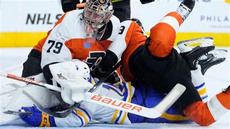 Goaltender Hart leaves Flyers game early with “mid-body” injury