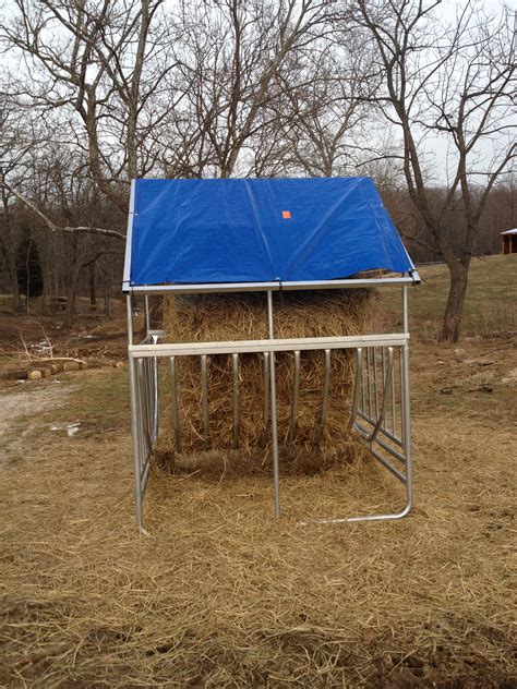 Goat hay feeder with roof. Top 10 DIY Hay Feeder for Goats. Following is a list of DIY hay feeder for goats. 1. Steel 8-Foot Hay Feeder Plans. Source Pinterest. The construction of a steel hay feeder 8 feet tall is an excellent project for novice builders. Steel is an option that is both long-lasting and economical. 