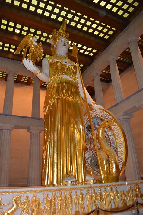 Goddesskathena. According to mythology, Athena was the favorite child of Zeus. She was said to have sprung from his head full-grown and clothed in armor. The goddess was usually shown wearing a helmet and carrying a spear and shield. Like her father, she also wore the magic aegis—a goatskin breastplate, fringed with snakes, that produced thunderbolts when ... 