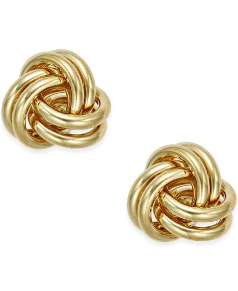 Gold knot earrings. 9ct Gold. DiamonFlash® Cubic Zirconia. Finest Quality Diamond Simulant. Knot Stud Earrings. Diameter : 0.6cm. Please Note - Earrings are for pierced ears only. In the interest of hygiene and for the protection of all our customers, earrings and pierced jewellery are excluded from our Exchange & Refund. To be sure - view instore! 
