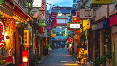 TOKYO, JAPAN JUNE 28 - 2017: Traditional back street bars in Shinjuku Golden Gai. Golden gai consists of 6 tiny alleys with 200 tiny bars and 20th century .... 