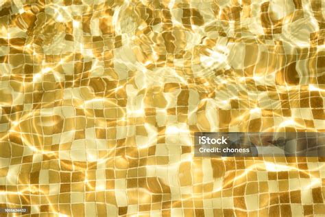 Golden swimming pool photos.  Available for both RF and RM licensing.  Dow...