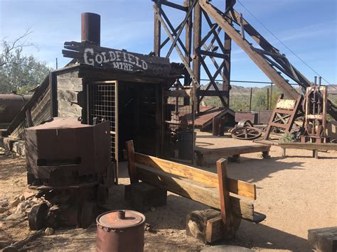 Goldfield ghost town az. The original town sprang up in 1892, peaking at 28 buildings, with a community of up to 4,000. Five years later, after prospectors had dug out all of the gold, the population deflated, and Goldfield went ghost dark. It had a sputtering revival between 1910 and 1926 (renamed as Youngsberg), then waned again. In 1943, a fire accidentally caused ... 