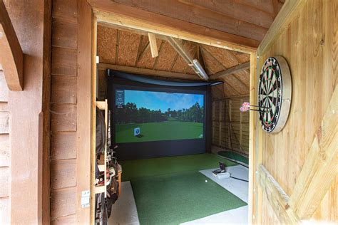 Golf simulator shed. Can keep door closed and hit with another person even in with me. It's been a few years but think I spent less than $2,000 on entire shed. the wood panel shed siding costs more than anything for it. My garage won't work for a simulator (height issues), so I'm thinking about the possibilities of an outdoor one. I have room on the side of my house. 