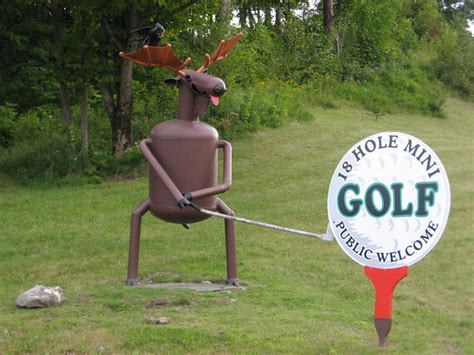 Two Players with Cart. . Golfmoose