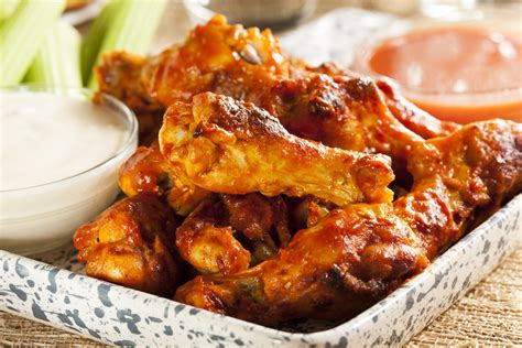 For some folks, gnawing between tiny bones for hard-to-get meat and getting sauce all over your face are a crucial part of the chicken wing experience. If you'd like a less messy a.... 