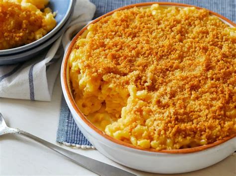 Good morning america macaroni and cheese recipes. Instructions. Spray a small baking dish with pam and preheat oven to 400. In the baking dish, make a layer of half the noodles, sprinkle on half the salt and top with pats of butter and 1 cup cheese. Repeat to make another layer of noodles, butter, salt and cheese. Pour in milk until the dish is about 1/3 full of milk. 