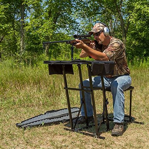 Feb 28, 2024 · Folds up for easy storage and carrying. Built in seat with slide left to right and forward and back (8”) to accommodate multiple shooting positions. Weighs 30 lbs. Table Top 36″ x 23 1/2 ” – plenty of room for all your gear and bench rest or shooting bags. Height 30″ adjustable to 32″ – each leg has independent adjustment to level ....