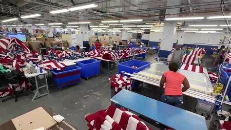 Goodwill Industries of South Florida empowers disabled individuals through flag-making operation
