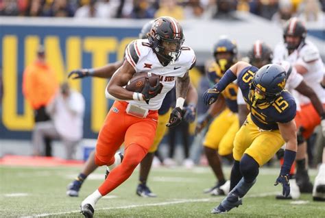 Gordon romps for 282 yards, 4 TDs, Oklahoma State outlasts West Virginia 48-34