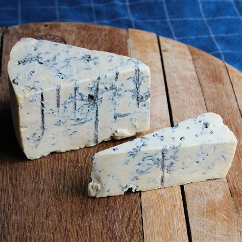 Gorgensola. Gorgonzola is a soft blue cheese with a very creamy texture. The fact that it is solely made with cow’s milk gives it a milder flavor than other blue cheeses that mix cow’s milk and goat’s milk. The mold in the Gorgonzola gives it a nutty aroma, while the milk gives it a milky aroma. 
