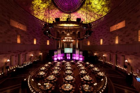 Gotham hall nyc. Gotham Hall. Standing: 800 max., Seated: 650 max. The 17,500-square-foot space features a main hall with a 70-foot ceiling and stained glass skylight as well as smaller event spaces including a lounge and a mezzanine level that overlooks the main hall. Make a statement by hosting your corporate or nonprofit event at one of New York City's most ... 