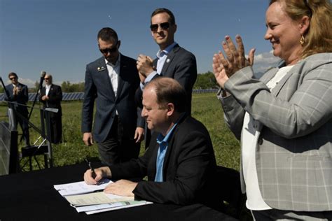 Gov. Jared Polis signs “enormous package” of green energy and climate change bills