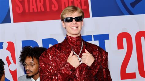 Sporting a blue double-breasted Dolce & Gabbana suit, Aviator shades, and enough ice to cool off the ESPYs red carpet on a sultry July afternoon in LA, Kansas forward Gradey Dick was in his element. The 6’8 freshman was more than a month into his college life at the time, having arrived at the University of Kansas on June 4.. 