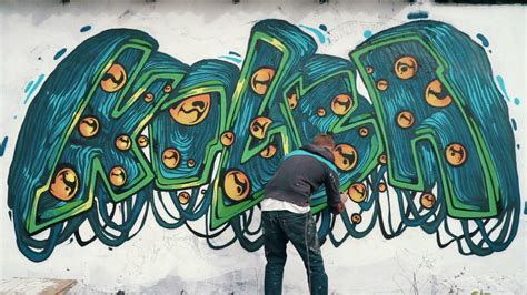 Graffiti in wall. Bao is a self-taught artist from Hong Kong who specializes in freestyle murals and illustrations. For this particular mural, created for the 2021 HKwalls street art festival, Bao painted a ... 