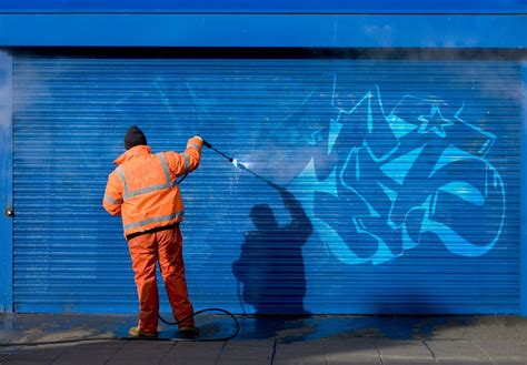 Graffiti removal service. The best method for removing painted graffiti from glass is to use a razor blade to carefully scrape it off. This method is 99 percent effective. Use the razor blade in a holder and scrape at a 30-degree angle to the glass. If the paint does not come completely off after using the razor blade, use ultra-fine bronze wool with water to … 