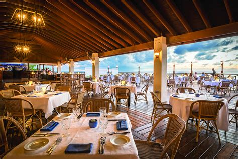 Grand cayman restaurants. Aug 29, 2023 · Once you’ve had your fill of the island’s capital, venture with a 20-minute drive to Thatch & Barrel, a modern Caribbean restaurant with a lunch and dinner menu filled with local flavors.Menu ... 