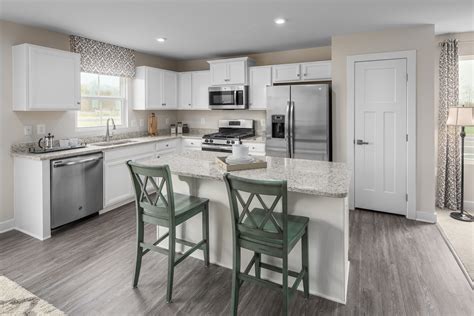 The Grand Cayman is the ideal home for your casual well-lived lifestyle. The open airy space combines the kitchen, dining area and great room to create a casual comfortable flow. This is the perfect place to do all your entertaining with plenty of room for your favorite overstuffed couch.