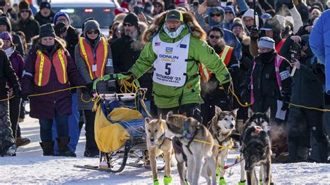 Grandson of Iditarod co-founder wins Alaska sled dog race