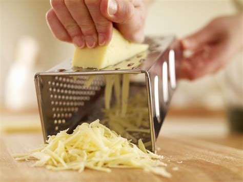 Grating cheese. If you try to grate too much cheese at once, it may become clumpy and difficult to work with. 3. Use a guard: The cheese grater attachment comes with a guard that helps prevent your fingers from coming into contact with the blades. Be sure to use this guard when grating cheese, as it will help keep you safe. 4. 