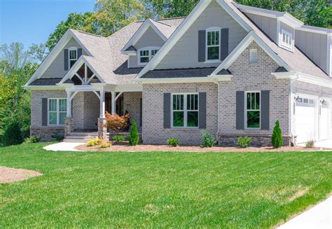 Gray brick house. Learn how to paint your brick home with a gray exterior color that suits your style and preferences. See 9 examples of gray brick houses with different color combinations, trim, and accents. Get inspired by Benjamin Moore, Sherwin Williams, and other paint brands. See more 