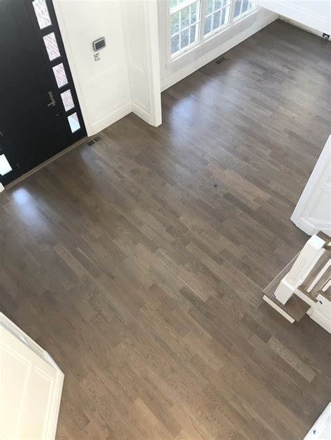 Gray hardwood floors. Barrington 18mm Smoked Grey Oak Brushed UV Oil Engineered Real Wood. View Free Sample. £50.16m2 Typical High St. Price £70.01m2. 28% Off Take an extra. 12% OFF. This product in our MARCH MADNESS Offer. Use code: 