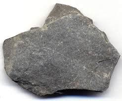 Gray shale. Expanded shale is formed when the shale is crushed and fired in a rotary kiln at 2,000 F. (1,093 C.). This process causes tiny air spaces in the shale to expand. The resulting product is called expanded or vitrified shale. This product is a lightweight, gray, porous gravel related to the silicate soil amendments perlite and vermiculite. Adding ... 