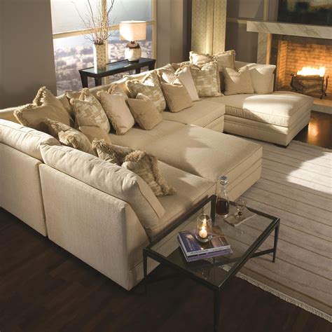 Great sectional. Arranging a sectional in the corner of a living room is a great way to utilize the space efficiently. Face the open side of the sectional towards the center of the room. This creates a more welcoming space for conversation. Float the sectional off the walls a few inches. This prevents it from feeling too crammed into the corner. 