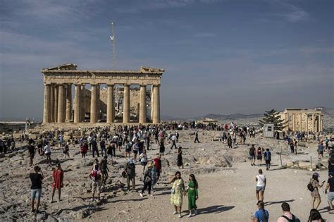 Greece plans hourly caps on visitors to ancient Acropolis and will let in up to 20,000 daily