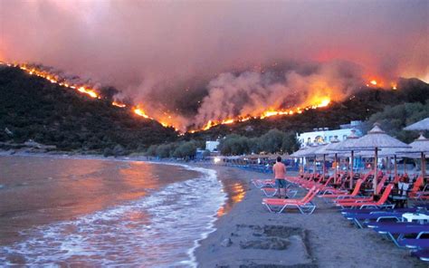 Greece wildfires blaze with no respite as islands evacuated