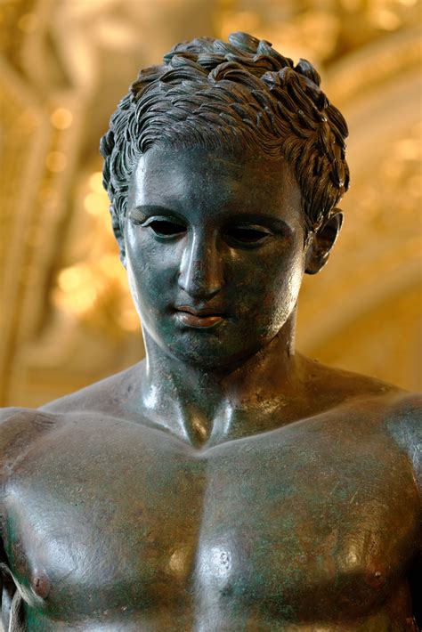 Greek sculpture. A striking ancient Greek style sculpture standing 45cm high. Dimensions: H 45cm W 19cm D 12cm Hand Painted Polyresin figure. 