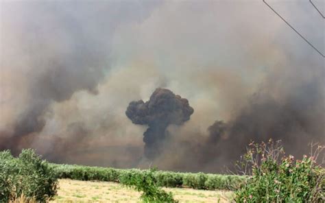 Greek wildfires trigger blasts at ammunition dump. EU agency records a huge carbon emissions spike
