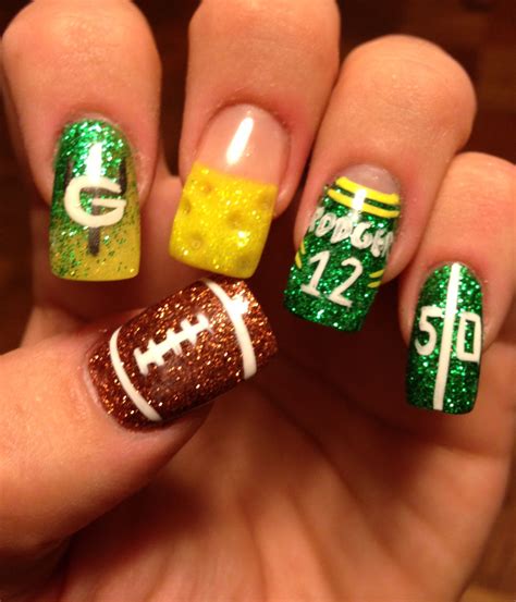 Green bay nail art. Show your love for the Green Bay Packers with these creative nail art ideas. Get inspired to paint your nails in green and gold and support your favorite team in style. Pinterest 