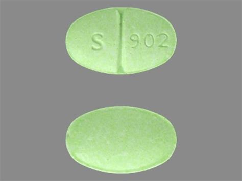 Pill Imprint S 902. This green elliptical / oval