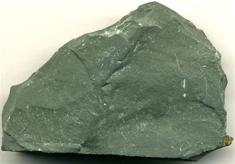 Green shale. The presence of micaceous minerals gives the rock a green color. Black and blue colors are often due to organic and carbonate elements. Different colors of shale Rock Composition Shale and other mudstones are primarily composed of clay minerals. The major clay minerals include kaolinite, illite, and montmorillonite. 