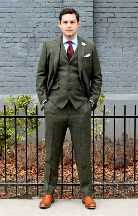 Green tweed suit. British Tweed Co - Tan Tweed Three Piece Suit £ 220.00 – £ 305.00; Made to Measure Olive Green w Red Overcheck Tweed Three Piece Suit £ 290.00 – £ 375.00; British Tweed Co - Classic Grey Herringbone Tweed Three Piece Suit £ 220.00 – £ 305.00; British Tweed Co - Charcoal Herringbone Tweed Three Piece Suit £ 220.00 – £ 305.00 