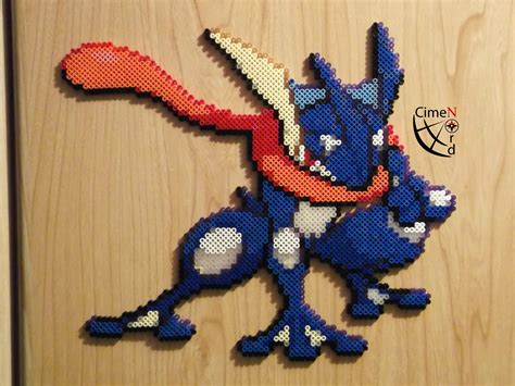 Greninja perler beads. Monkey used a square Perler bead board to make each design. After she designed her Pokemon, she laid a piece of wax paper over the deign and ironed them on low heat for about 30 seconds. Wait for the beads to cool, then flip the design over. Re-cover with the wax paper and iron for 30 seconds on the back side to seal the beads together. 