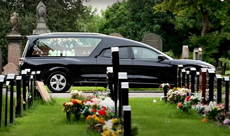 Grey funeral cars. .  ...