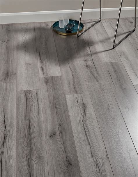 Grey laminate flooring bandq. For a timeless look that improves and develops with age, choose one of our solid wood floors. Made from single pieces of wood, this flooring range comes in a selection of finishes, from dove grey to coffee, and is great for high-traffic areas such as hallways, living rooms and bedrooms. This ... 