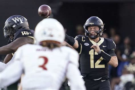 Griffis throws for 3 touchdowns to lead Wake Forest past Elon 37-17 in season opener