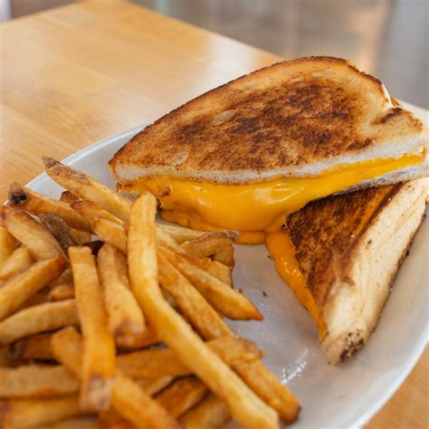 Grilled cheese restaurant. Gourmet Grilled Cheese Sandwiches & Other Cheesy Goodies. HUNTINGTON BEACH 120 5th St. Huntington Beach, CA Tel: (714) 536-3162. Monday – Tuesday: Closed 