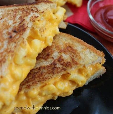 Grilled mac and cheese sandwich. Place bread butter-side down in the hot skillet; add 1 slice of cheese. Butter a second slice of bread on one side and place butter-side up on top of cheese. Cook until lightly browned on one side; flip over and continue cooking until cheese is melted. Repeat with remaining 2 slices of bread, butter, and slice of cheese. 