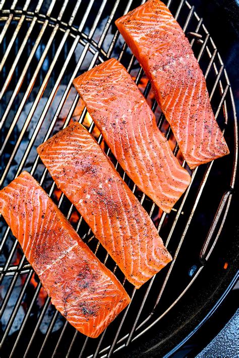 Grilled salmon temp. First step; preheat the traeger pellet grill (or other pellet smoker) to 350 degrees F. Then, rinse the salmon fillet and pat dry with paper towels. Place salmon in a large bowl, baking pan, or on a baking sheet. In a small bowl mix the oil, coconut aminos, lemon, and spices. 